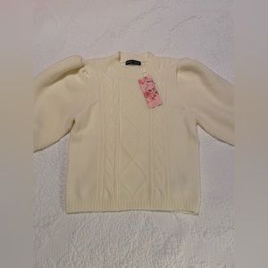 Cream short sleeve sweater. Brand new never worn.